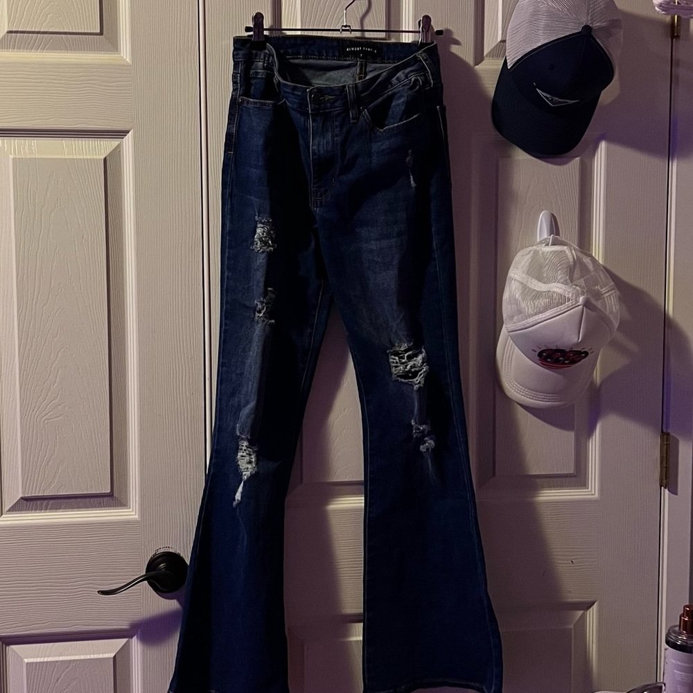Ripped denim flare jeans